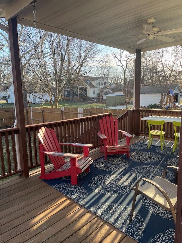 814 E Normal St, Kirksville, MO 63501 - wooden terrace featuring ceiling fan and fence