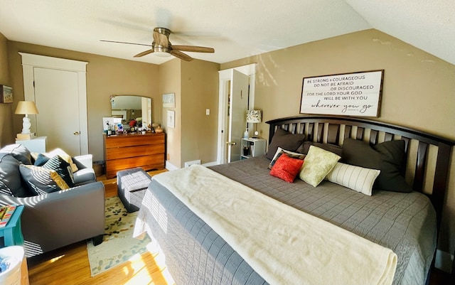814 E Normal St, Kirksville, MO 63501 - bedroom with a ceiling fan, vaulted ceiling, and wood finished floors