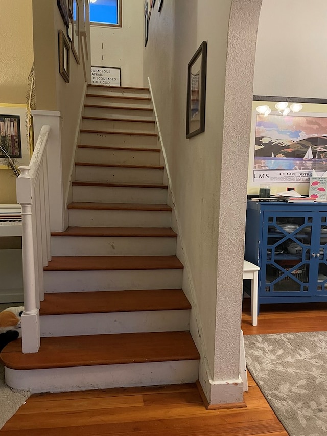 814 E Normal St, Kirksville, MO 63501 - staircase with wood finished floors and a textured wall