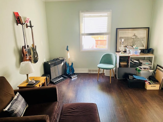 814 E Normal St, Kirksville, MO 63501 - sitting room featuring baseboards, visible vents, and wood finished floors