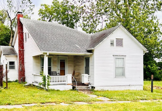 view of front of home featuring covered porch