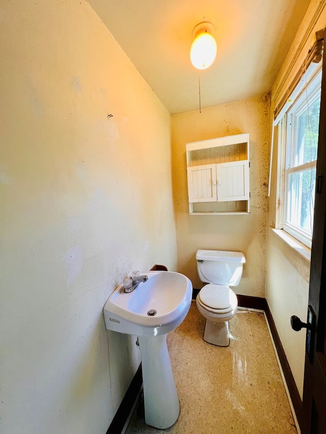 bathroom featuring toilet