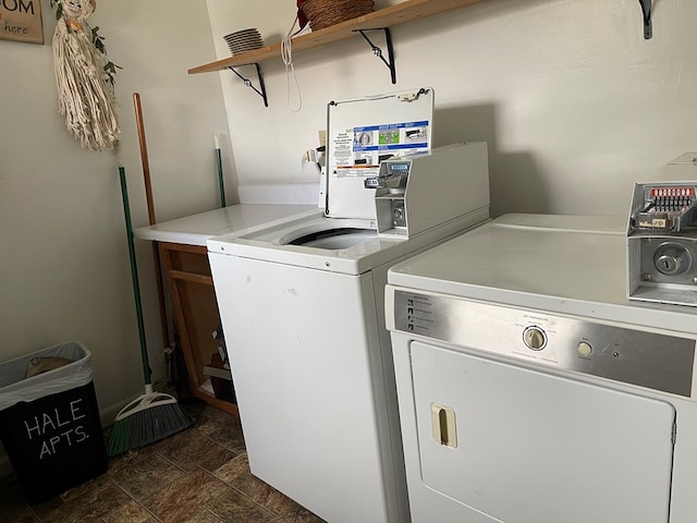 washroom featuring washer and dryer