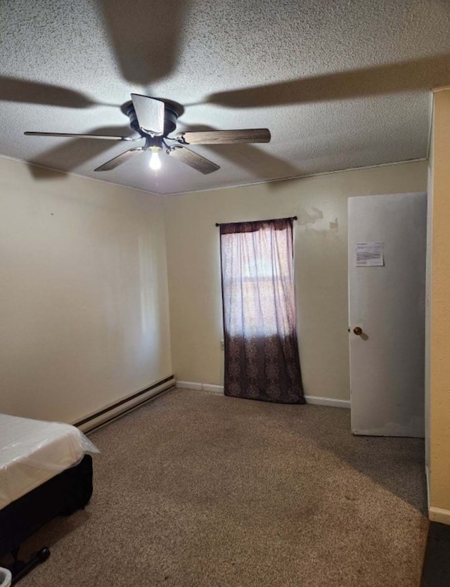 unfurnished bedroom featuring a textured ceiling, ceiling fan, carpet floors, and baseboard heating