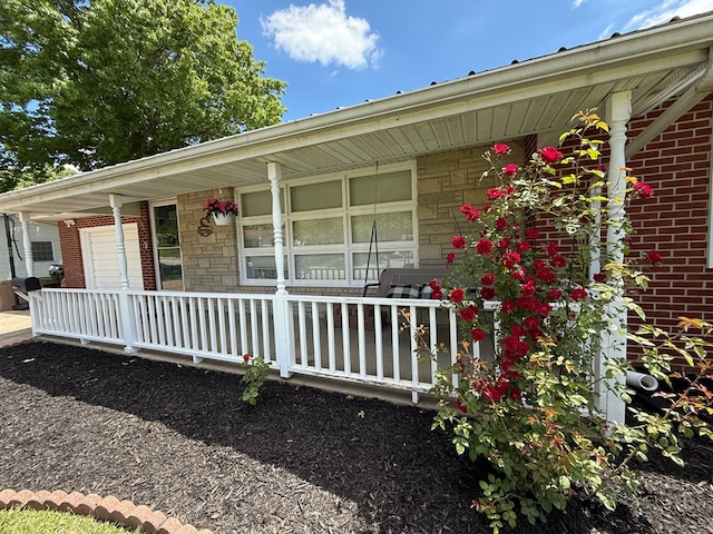 33 Overbrook Dr, Kirksville, MO 63501 - view of front of property with a porch, stone siding, and brick siding