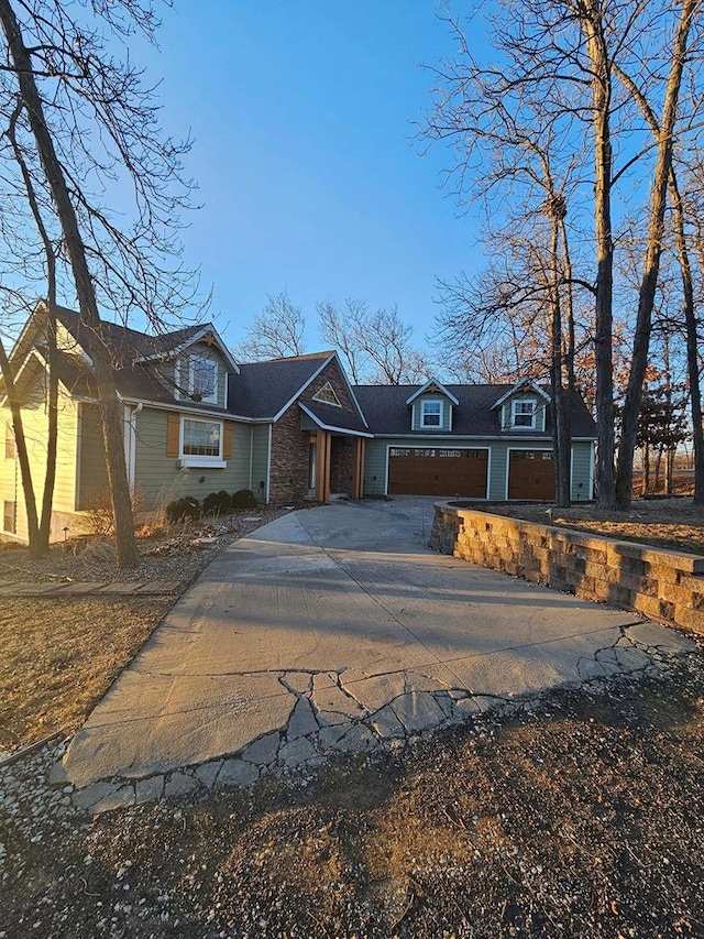 view of front of home featuring a garage and driveway