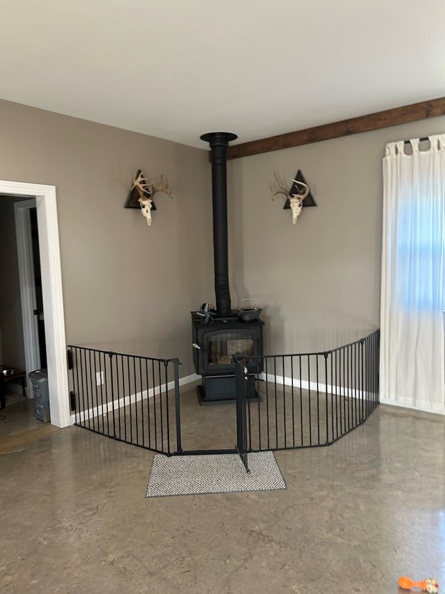 living room featuring a wood stove