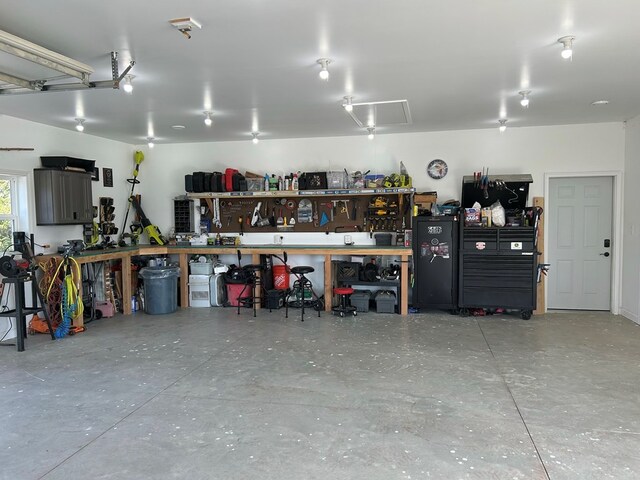 garage featuring a workshop area