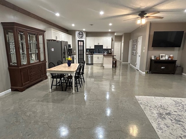 dining area featuring ceiling fan