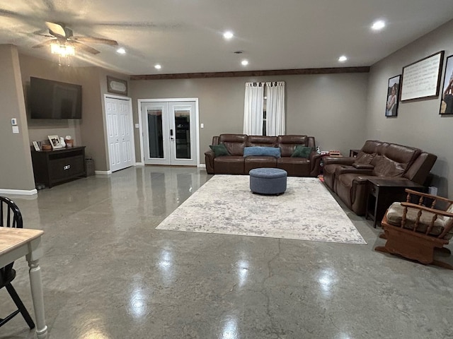 living room with ceiling fan and french doors