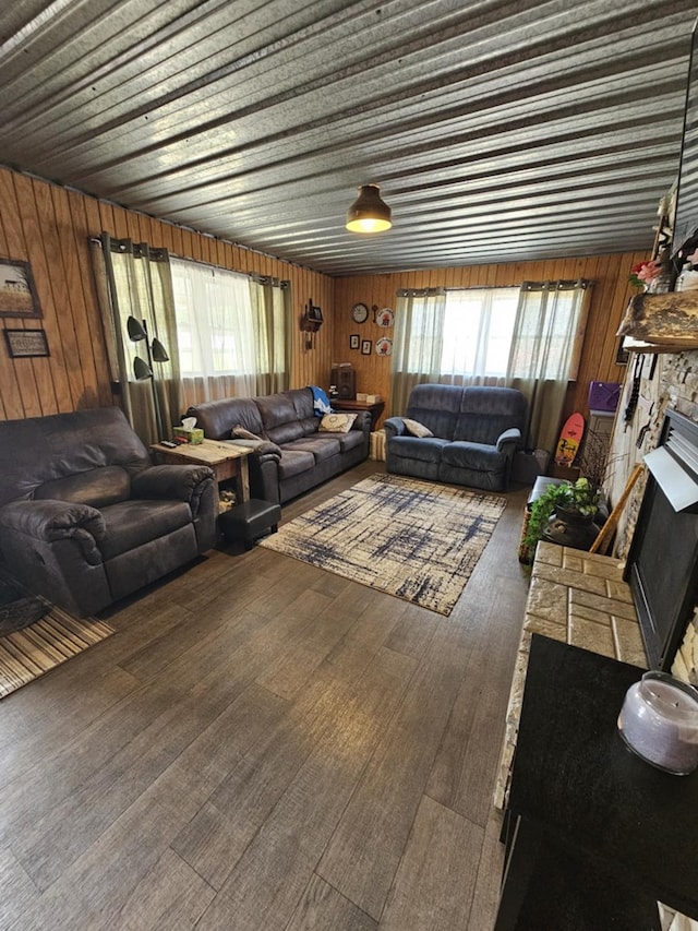 living room with wood walls