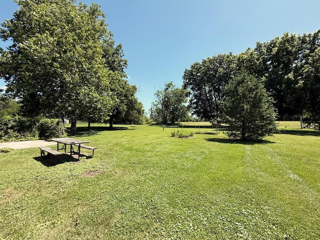 1921 First St, Kirksville, MO 63501 - view of community featuring a lawn