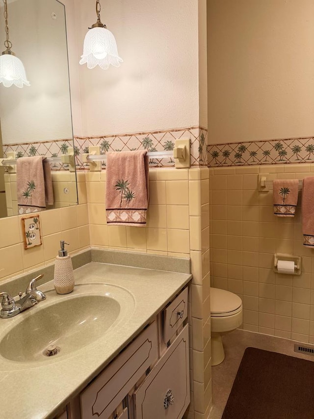 1921 First St, Kirksville, MO 63501 - bathroom with tile walls and vanity