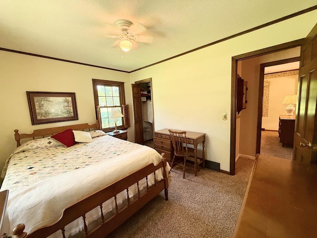 1921 First St, Kirksville, MO 63501 - bedroom featuring carpet flooring, crown molding, and ceiling fan