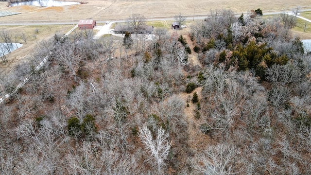 birds eye view of property featuring a rural view