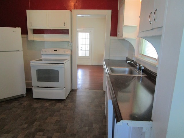709 E Line St, Kirksville, MO 63501 - kitchen with white appliances, open shelves, white cabinetry, and plenty of natural light