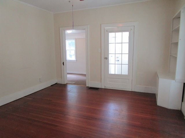 709 E Line St, Kirksville, MO 63501 - doorway to outside featuring wood finished floors, crown molding, and ceiling fan