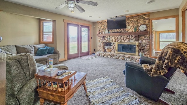 26831 State Highway 11, Kirksville, MO 63501 - living room featuring ceiling fan, visible vents, carpet, and a wealth of natural light