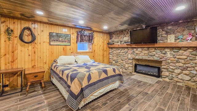 26831 State Highway 11, Kirksville, MO 63501 - bedroom featuring a fireplace, wood tiled floor, recessed lighting, and wooden ceiling