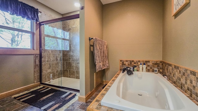 26831 State Highway 11, Kirksville, MO 63501 - full bathroom with a shower stall, baseboards, and a bath