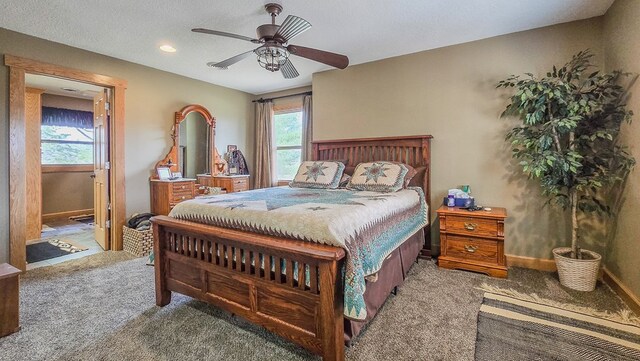 26831 State Highway 11, Kirksville, MO 63501 - carpeted bedroom featuring baseboards and a ceiling fan