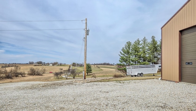 26831 State Highway 11, Kirksville, MO 63501 - view of yard with an outdoor structure, a garage, and a rural view