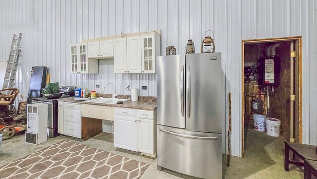 26831 State Highway 11, Kirksville, MO 63501 - kitchen with white cabinets, a sink, stainless steel appliances, and glass insert cabinets