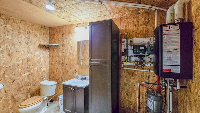 26831 State Highway 11, Kirksville, MO 63501 - bathroom featuring water heater, toilet, and vanity