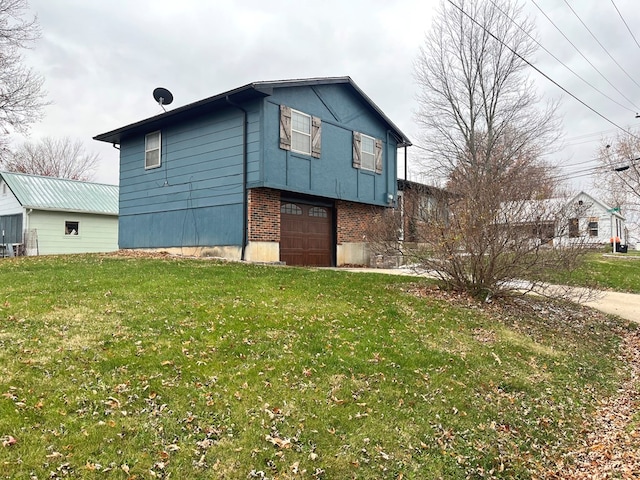 view of home's exterior featuring a garage and a lawn