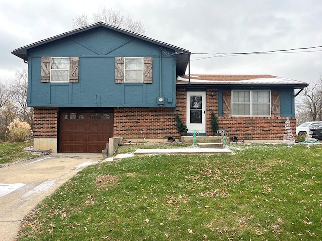 split level home with a garage and a front yard