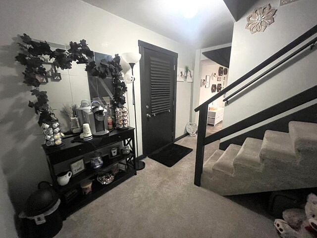 639 Missouri Ave, Chillicothe, MO 64601 - entryway featuring carpet flooring and stairway