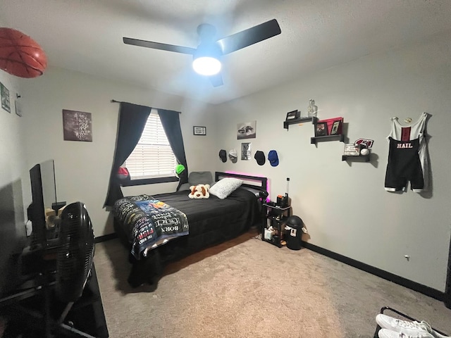 carpeted bedroom with ceiling fan