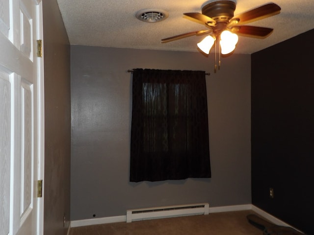 carpeted spare room with a textured ceiling, a baseboard radiator, and ceiling fan