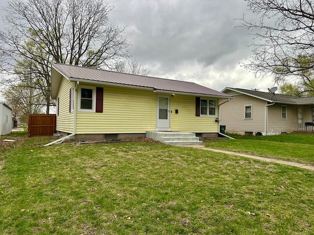 1113 N Luther St, Kirksville, MO 63501 - back of property with a lawn and metal roof