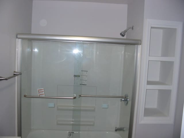 bathroom with shower / bath combination