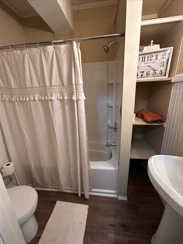 1617 N Church St, Marceline, MO 64658 - bathroom with wood finished floors, shower / tub combo, and ornamental molding