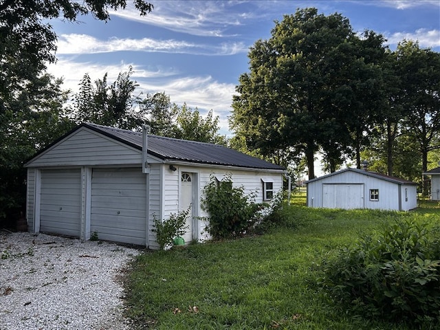 1617 N Church St, Marceline, MO 64658 - view of detached garage