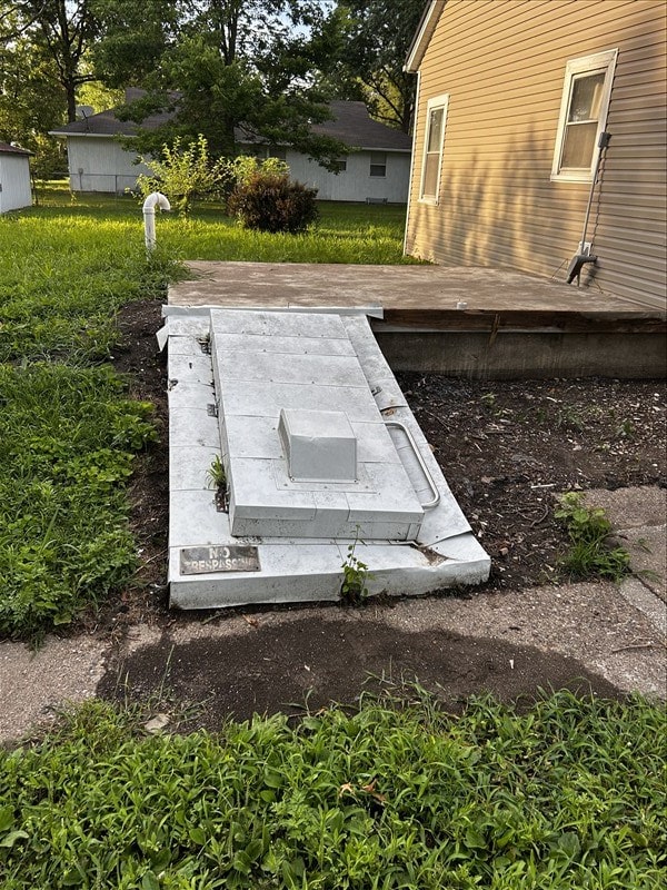 1617 N Church St, Marceline, MO 64658 - entry to storm shelter