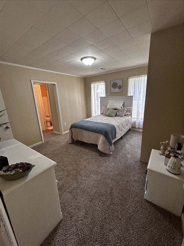 1617 N Church St, Marceline, MO 64658 - bedroom with carpet and connected bathroom
