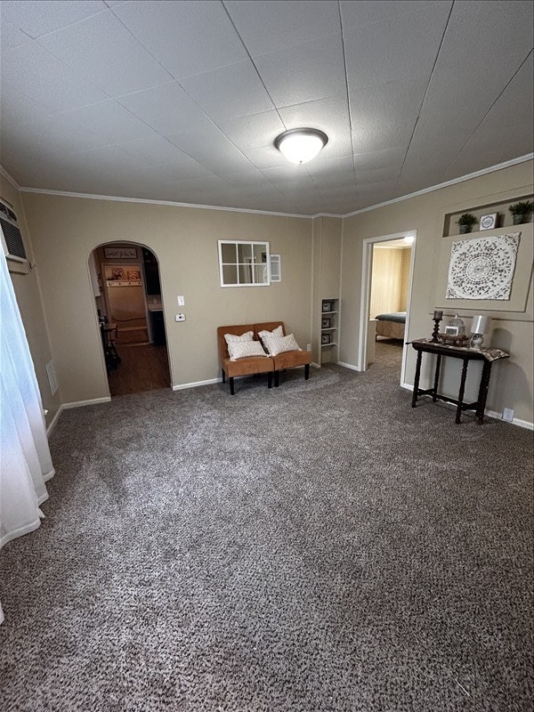 1617 N Church St, Marceline, MO 64658 - bedroom with arched walkways, ornamental molding, and carpet flooring