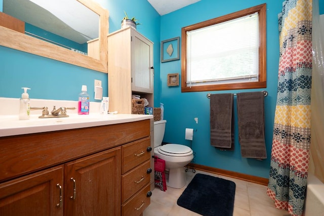624 Mckinley, Moberly, MO 65270 - bathroom with vanity, toilet, tile patterned flooring, baseboards, and shower / bath combination with curtain