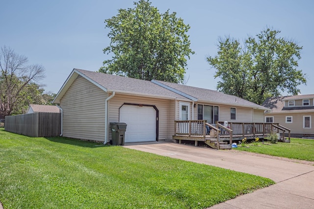 624 Mckinley, Moberly, MO 65270 - single story home with a garage, a front yard, concrete driveway, and a deck