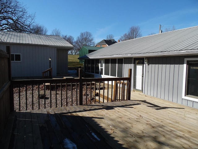 deck featuring a sunroom