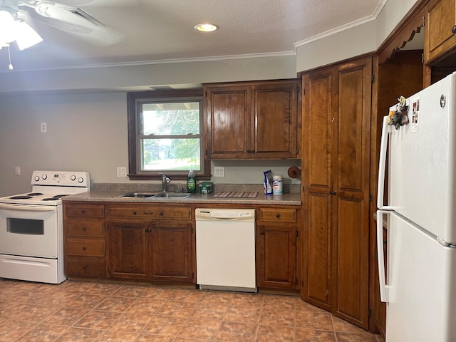 kitchen featuring ceiling fan, sink, crown molding, a textured ceiling, and white appliances