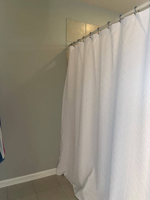 bathroom featuring tile patterned flooring