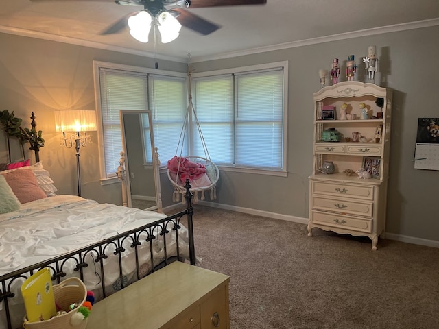 carpeted bedroom featuring ceiling fan and ornamental molding