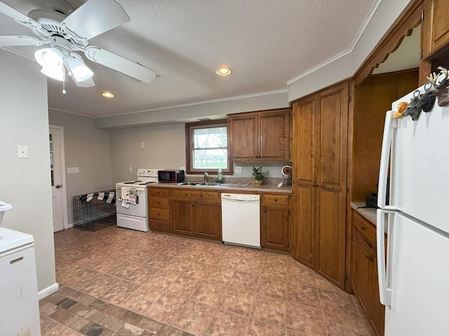 kitchen featuring light countertops, white appliances, brown cabinets, and ornamental molding