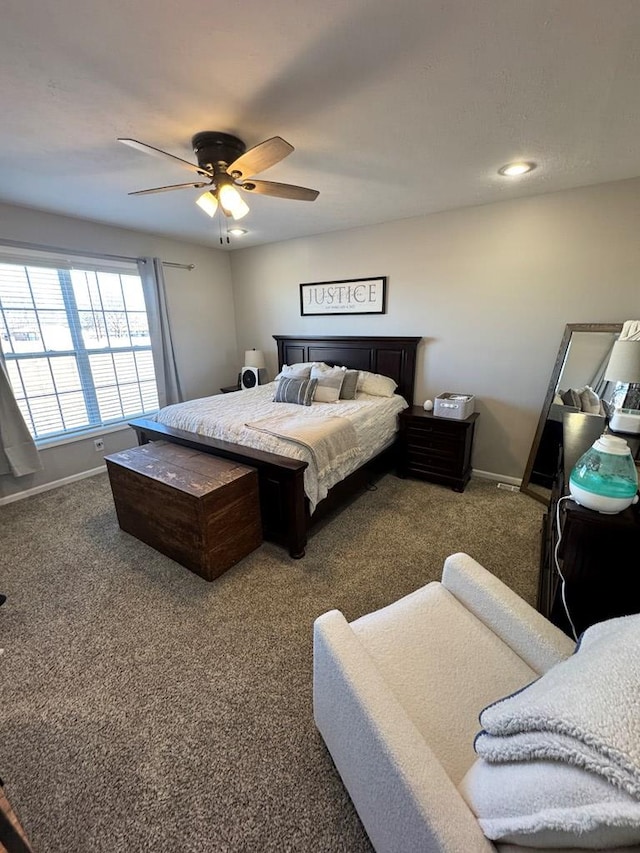 carpeted bedroom with ceiling fan