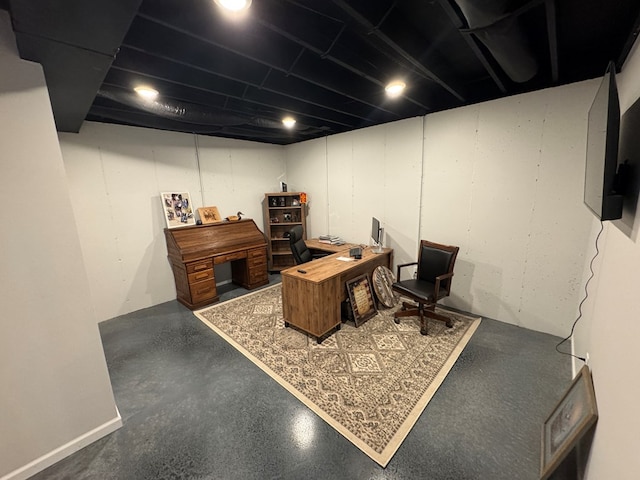 office space featuring concrete flooring