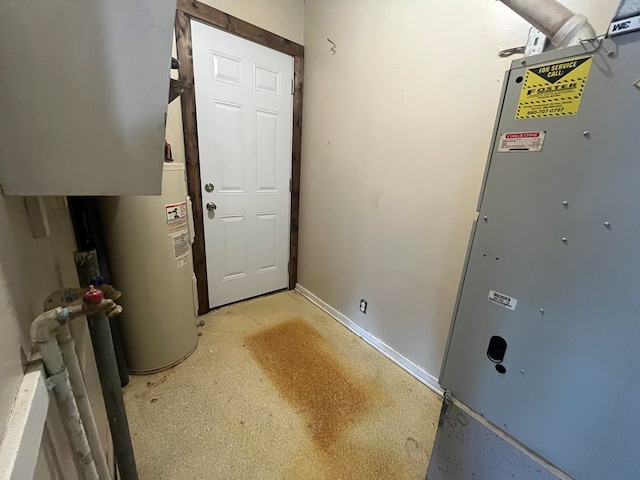 115 Polk St, Chillicothe, MO 64601 - utility room with water heater